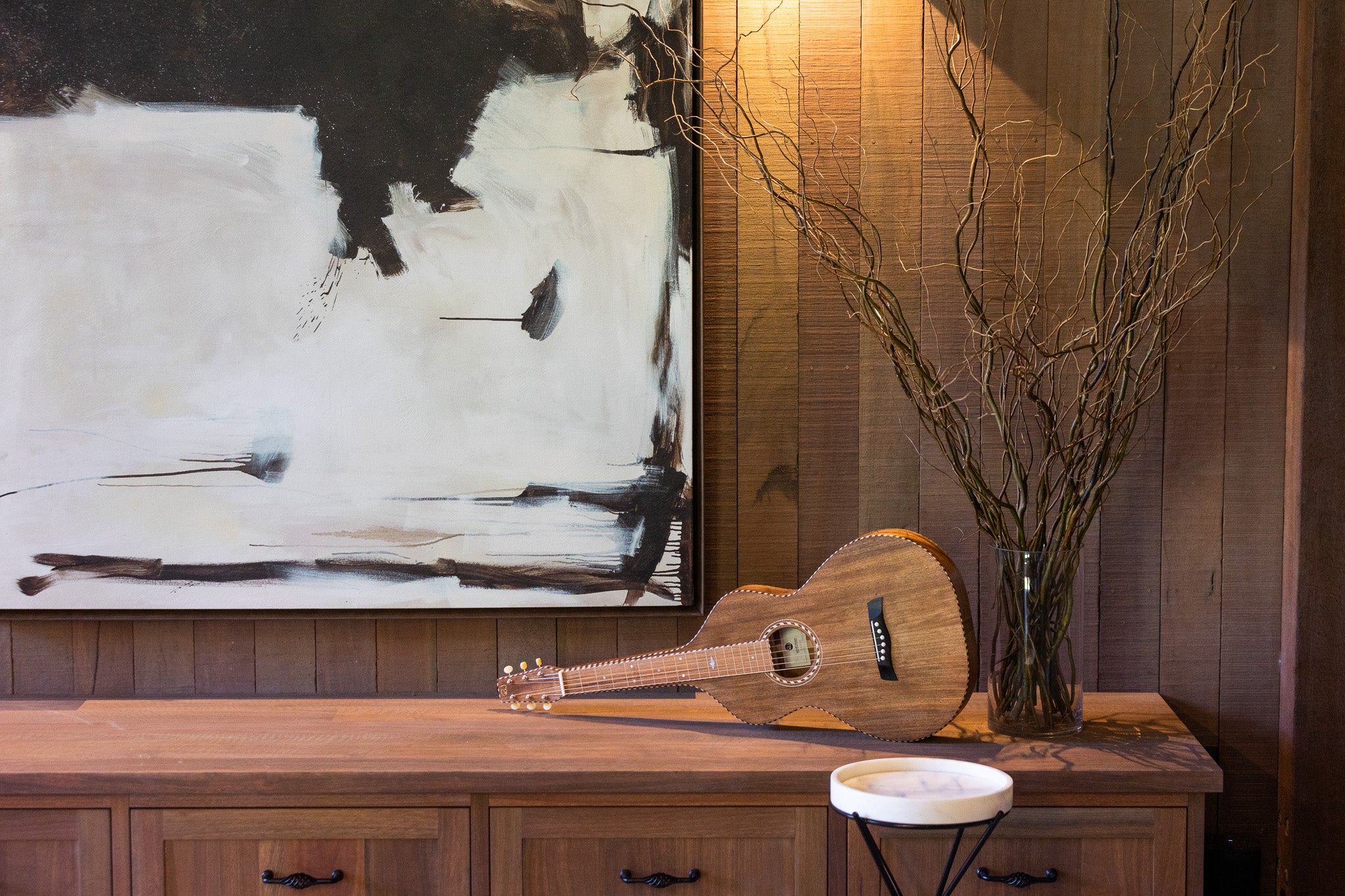 Style 4 Weissenborn Lap Steel Slide Guitar styled in country home with modern art and branches