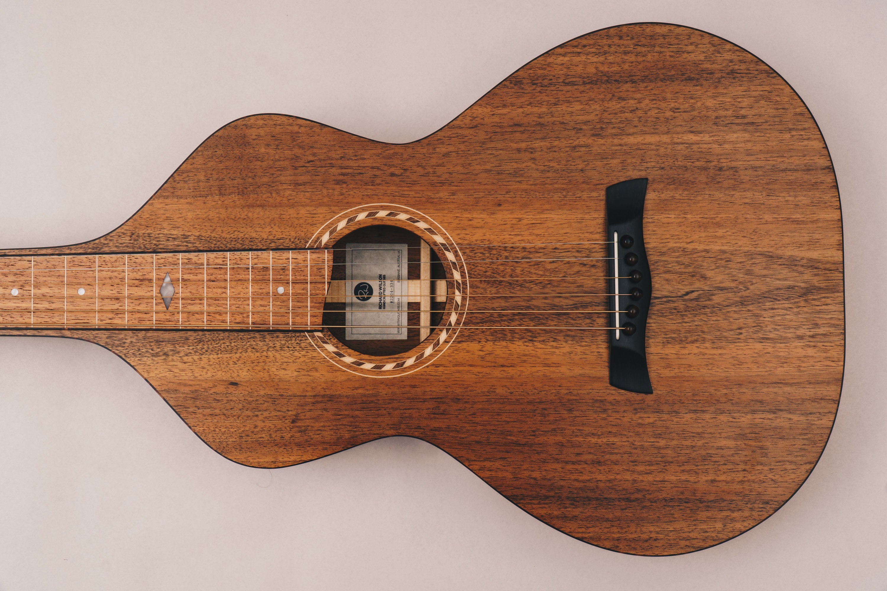 Style 2 Weissenborn guitar featuring tortoiseshell binding, tuning machines and bridge pins by Richard Wilson.